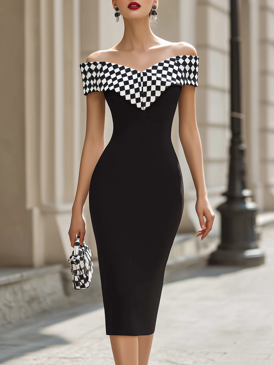 Elegant black and white midi dress with shoulder cut-out