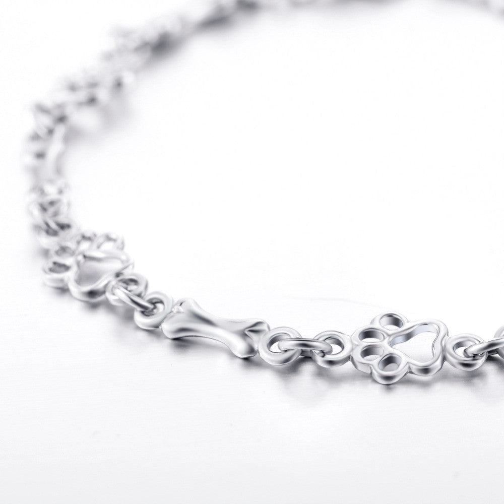 Limited Edition Pure Silver Dog Paw and Bone Charm Bracelet