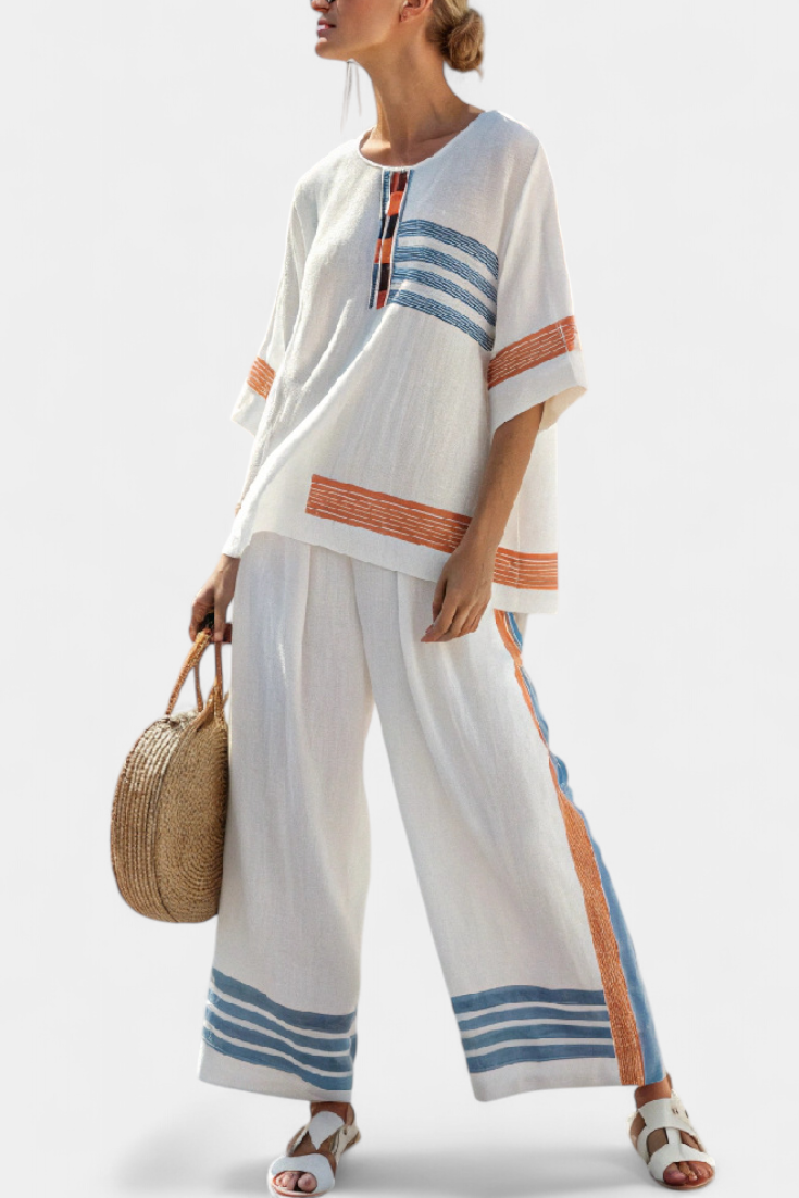 White Daisy ethnic sets with blue and orange details – unique and vibrant style
